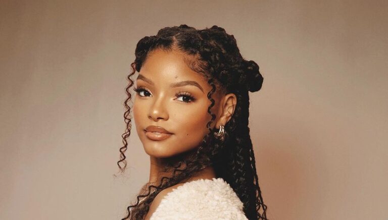 Halle Bailey Stuns in Luxe Fur Coat and Elegant Dress